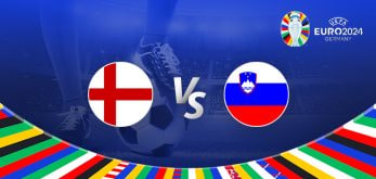 The image is a promotional graphic for the Euro 2024 football match between England and Slovenia. It features the national flag of England on the left and the national flag of Slovenia on the right, with a large "Vs" in the center. In the background, there is a football stadium under bright lights, creating a dramatic atmosphere. The top right corner displays the Euro 2024 logo, and the bottom edge is decorated with a colorful border showcasing various national flags. A close-up of a player's leg and a football is visible in the background, emphasizing the competitive nature of the upcoming match.