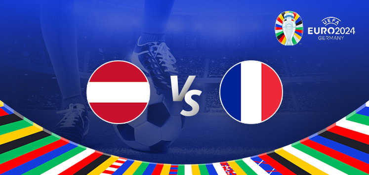 The image is a promotional graphic for the Euro 2024 football match between Austria and France. It features the national flags of Austria (a horizontal bicolour of red and white) and France (a vertical tricolour of blue, white, and red) positioned on either side of the letters "Vs" in the centre. The background shows a football stadium under bright lights, with a close-up of a player's leg and a football in the centre. The top right corner displays the Euro 2024 logo along with the tournament name and location, "Germany." The bottom edge is adorned with a colourful border featuring various national flags.