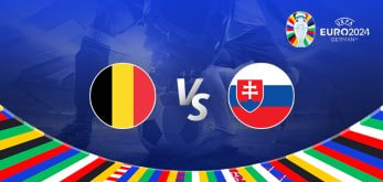 The image is a promotional graphic for the Euro 2024 football match between Belgium and Slovakia. It features the national flags of Belgium (a vertical tricolour of black, yellow, and red) and Slovakia (a horizontal tricolour of white, blue, and red with the Slovak coat of arms) positioned on either side of the letters "Vs" in the centre. The background shows a football stadium under bright lights, with a close-up of a player's leg and a football in the centre. The top right corner displays the Euro 2024 logo along with the tournament name and location, "Germany."