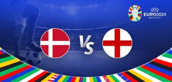 The image is a promotional graphic for the Euro 2024 football match between Denmark and England. It features the national flags of Denmark (a red flag with a white Scandinavian cross) and England (a red cross on a white background). The flags are positioned on either side of a large 'Vs' in the center. The background depicts a football stadium under bright lights, with a close-up of a player's leg and a football in the bottom left corner. The top right corner displays the Euro 2024 logo along with the tournament name and location, "Germany." The bottom edge is adorned with a colorful border featuring various national flags.