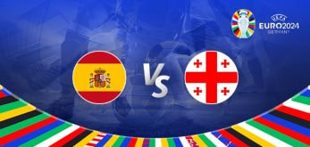 This promotional graphic for the Euro 2024 football match between Spain and Georgia features a dynamic design. The central part of the image showcases the national flags of Spain (a red and yellow flag with the national coat of arms) on the left and Georgia (a white flag with five red crosses) on the right, separated by a large "Vs" in white text. Below the flags is a colorful arc composed of multiple national flags, reflecting the international nature of the tournament. The background depicts a stadium with blue tones and spotlights, enhancing the sense of a major sporting event. The Euro 2024 logo is integrated at the top right, branding the event. The overall composition uses light and shadow to create depth and focus on the central clash between Spain and Georgia.