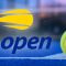 US Open tennis logo with a yellow tennis ball on a blue court, with a blurred background.