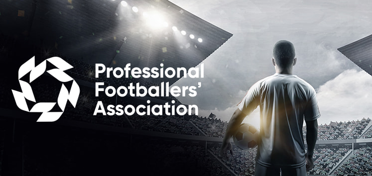 The image shows a silhouette of a football player holding a football, standing in a stadium filled with spectators. The player faces away from the camera, with the stadium lights illuminating the scene. To the player's left is the Professional Footballers' Association (PFA) logo, which consists of a stylised circular design. "Professional Footballers' Association" is written next to the logo. The overall atmosphere of the image is dramatic, emphasising the grandeur and significance of professional football.