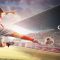 A football player in a white and red kit is mid-air, about to strike the ball on a stadium field during a UEFA Champions League match, with the Champions League logo on the right.