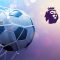 The image shows a football hitting the back of a net with a blurred, colourful background. The Premier League logo features a stylised lion's head with a crown in the top right corner. The overall theme suggests excitement and anticipation surrounding a Premier League weekend.