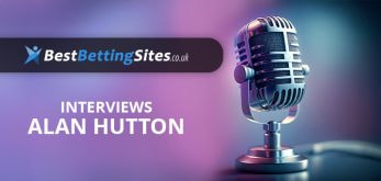 Image of a microphone with the BestBettingSites.co.uk logo, promoting an interview with former Premier League footballer Alan Hutton.