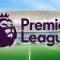 Premier League logo displayed over an empty football stadium with green pitch and blue seating.