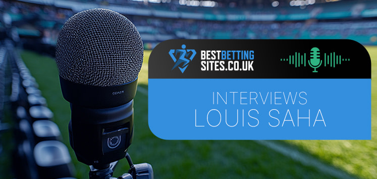 Image of a microphone set up near the sidelines of a football stadium with the BestBettingSites.co.uk logo and the text "Interviews Louis Saha" overlaid, indicating an interview with the former footballer.